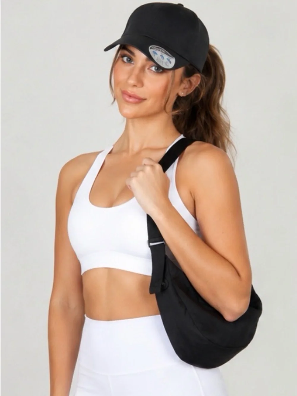 Ponyflo Black Active Ponyflo Cap with Matching Black Bag.